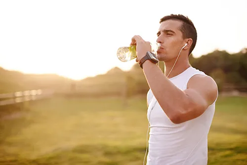 runner drinking water
